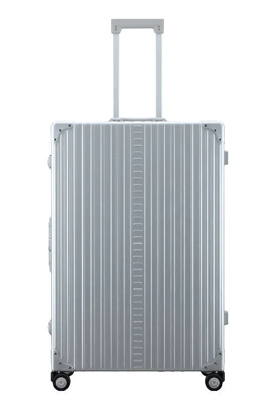 Leather luggage handles for a comfortable and stylish gripAleon 32" Macro Traveler Aluminum Hardside Checked Luggage (Platinum) Silver