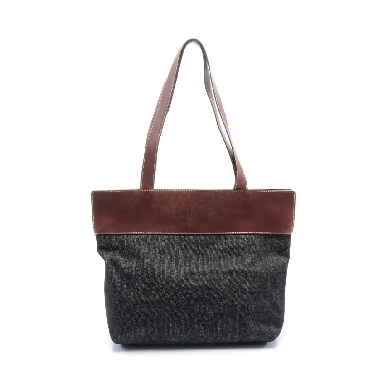 Medium - Sized Canvas Tote Bag in Navy Blue with Striped Pattern for a Nautical - Inspired LookChanel Coco Mark Denim Leather Tote Bag Medium - Sized Canvas Tote Bag in Navy Blue with Striped Pattern for a Nautical - Inspired LookChanel Coco Mark Denim Leather Tote Bag