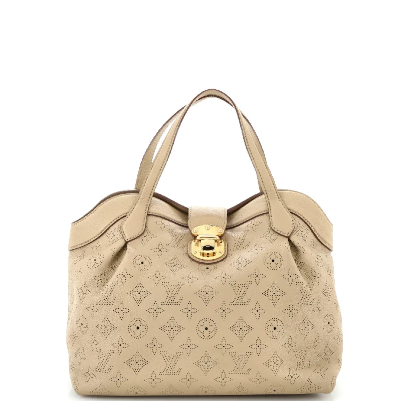 Canvas and Leather Combo Shoulder Bag in Tan for a Rustic LookCirrus Handbag Mahina Leather PM Canvas and Leather Combo Shoulder Bag in Tan for a Rustic LookCirrus Handbag Mahina Leather PM