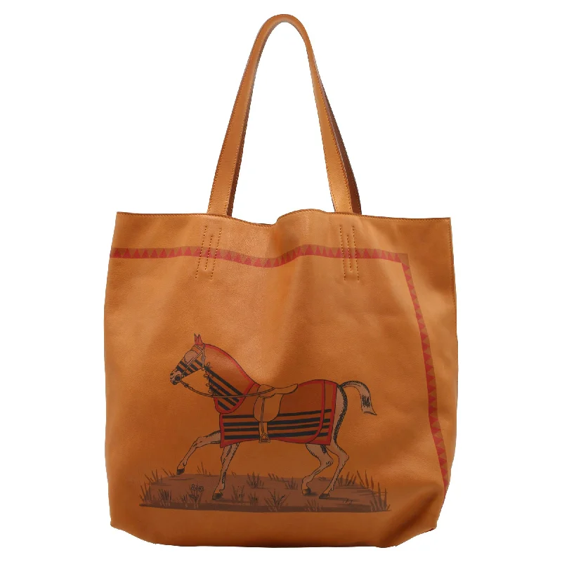 Women's Tote Bag with Magnetic Closure in Orange for Easy Access on the GoHermes Double Sens 36 Horse Print Reversible Tote Bag in Orange Leather Women's Tote Bag with Magnetic Closure in Orange for Easy Access on the GoHermes Double Sens 36 Horse Print Reversible Tote Bag in Orange Leather