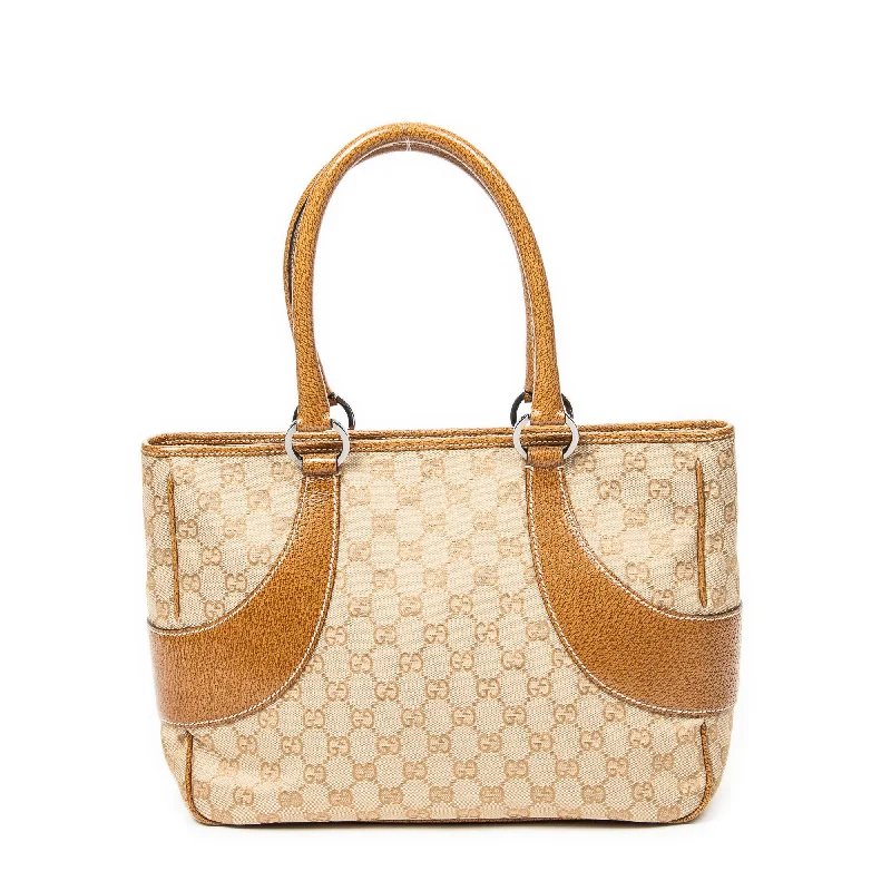 Metallic Tote Bag in Rose Gold with Chain Handles for a Glamorous Night OutJacquard Zip Tote Metallic Tote Bag in Rose Gold with Chain Handles for a Glamorous Night OutJacquard Zip Tote