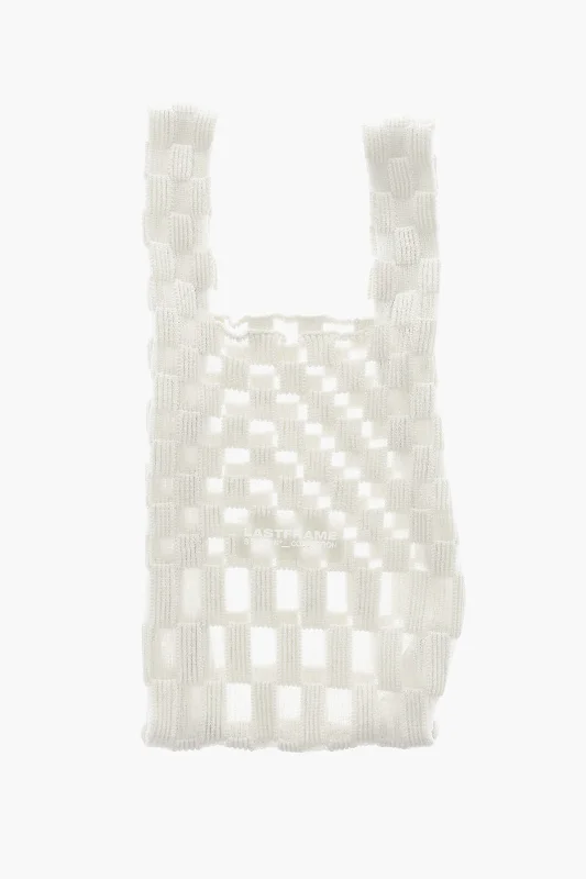 Quilted Tote Bag in Cream with Silver Hardware for a Classic and Sophisticated StyleLast Frame Checked Tote Bag With See-Through Details Quilted Tote Bag in Cream with Silver Hardware for a Classic and Sophisticated StyleLast Frame Checked Tote Bag With See-Through Details