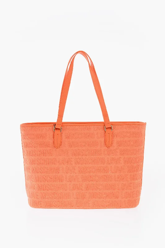 Geometric - Printed Tote Bag in Multicolor for a Contemporary and Trendy OutfitMoschino Love Faux Leather And Sponge Tote Bag With Embossed Logo Geometric - Printed Tote Bag in Multicolor for a Contemporary and Trendy OutfitMoschino Love Faux Leather And Sponge Tote Bag With Embossed Logo
