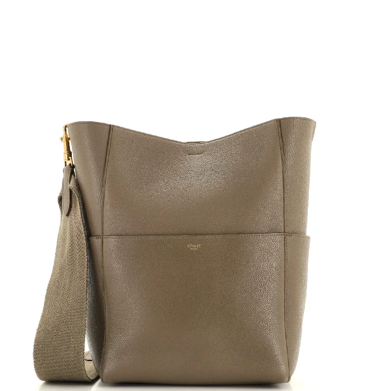Pvc Shoulder Bag in Clear with Glitter for a Fun and Modern LookSangle Seau Bag Calfskin Large Pvc Shoulder Bag in Clear with Glitter for a Fun and Modern LookSangle Seau Bag Calfskin Large