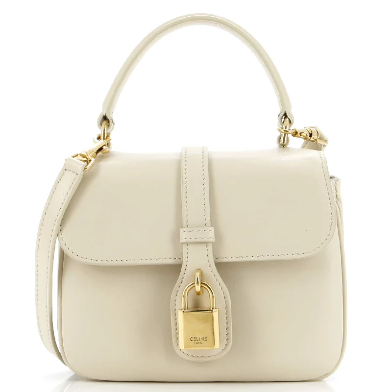 Metallic Shoulder Bag in Gold for Special OccasionsTabou Top Handle Bag Smooth Calfskin Mini Metallic Shoulder Bag in Gold for Special OccasionsTabou Top Handle Bag Smooth Calfskin Mini