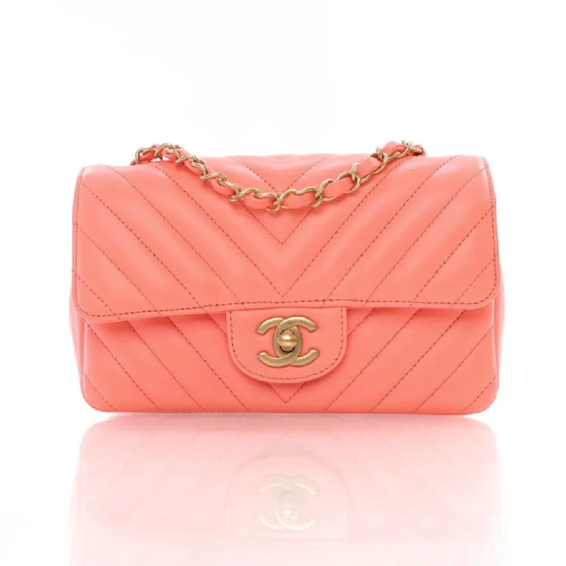 Medium - sized Canvas Crossbody Bag in Beige with Floral Print for Spring OutingsChanel Chevron Mini Rectangle Pink Lambskin