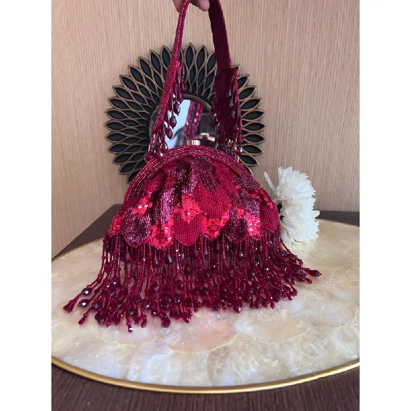 Suede Clutch with Tassel Details in Olive for Fall SoireesNayaab by Sonia Symphony Amaryllis Maroon Clutch for Women Suede Clutch with Tassel Details in Olive for Fall SoireesNayaab by Sonia Symphony Amaryllis Maroon Clutch for Women